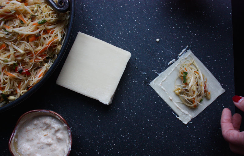 rolling Thai spring rolls