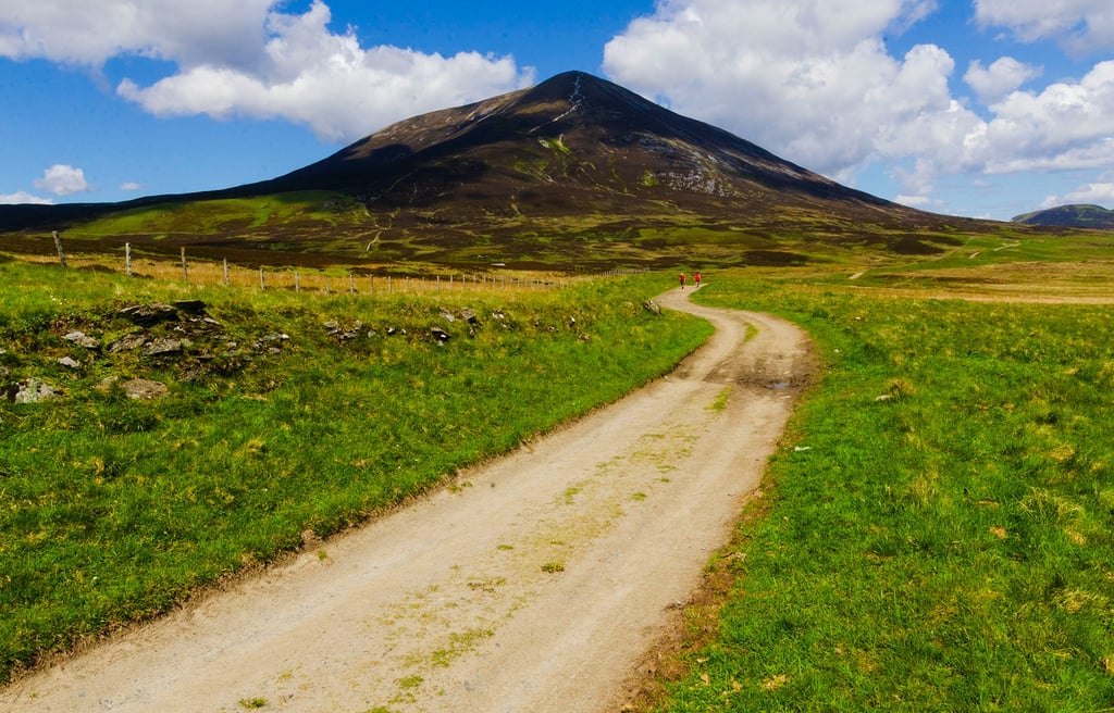 Trail through Glen Tilt in the Cairngorms National Park near Blair Atholl with the peak Carn Liath