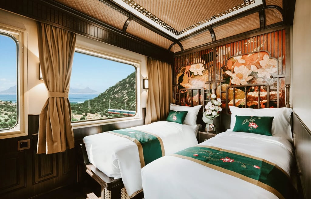 Golden Eagle Vietnam Express luxury sleeper train twin cabin with panoramic views.