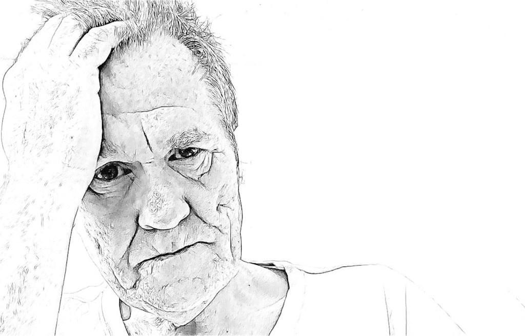 Pencil drawing of man holding his head in pain.
