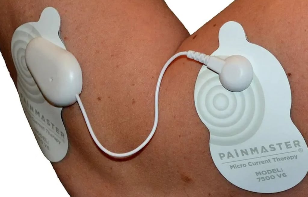Painmaster Microcurrent Therappy patches used for elbow pain.