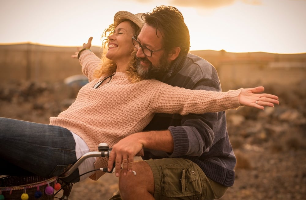 Middle aged couple enjoying life with freedom