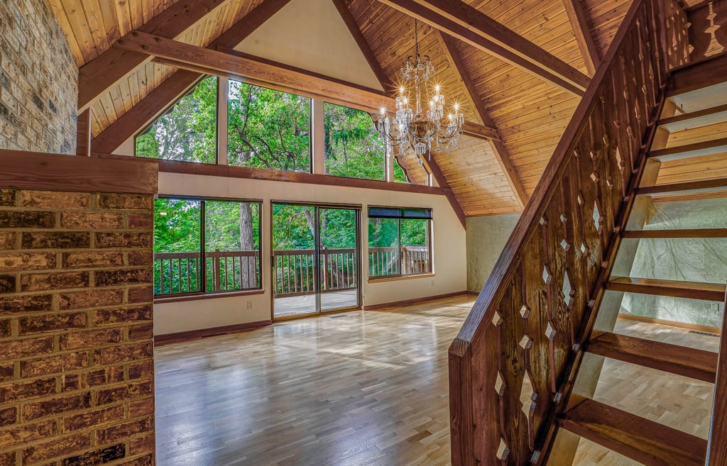 Real estate photo of a living room highlighting interior design details and natural light.
