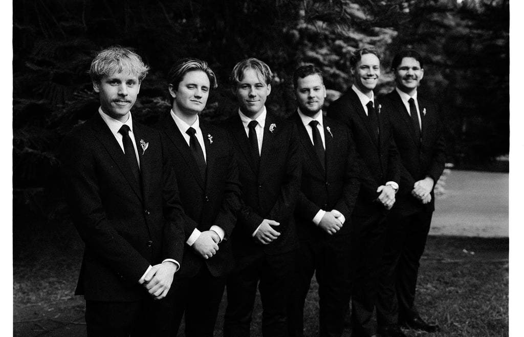 Black and white portrait of the groom and groomsmen at Adelaide Botanic Garden