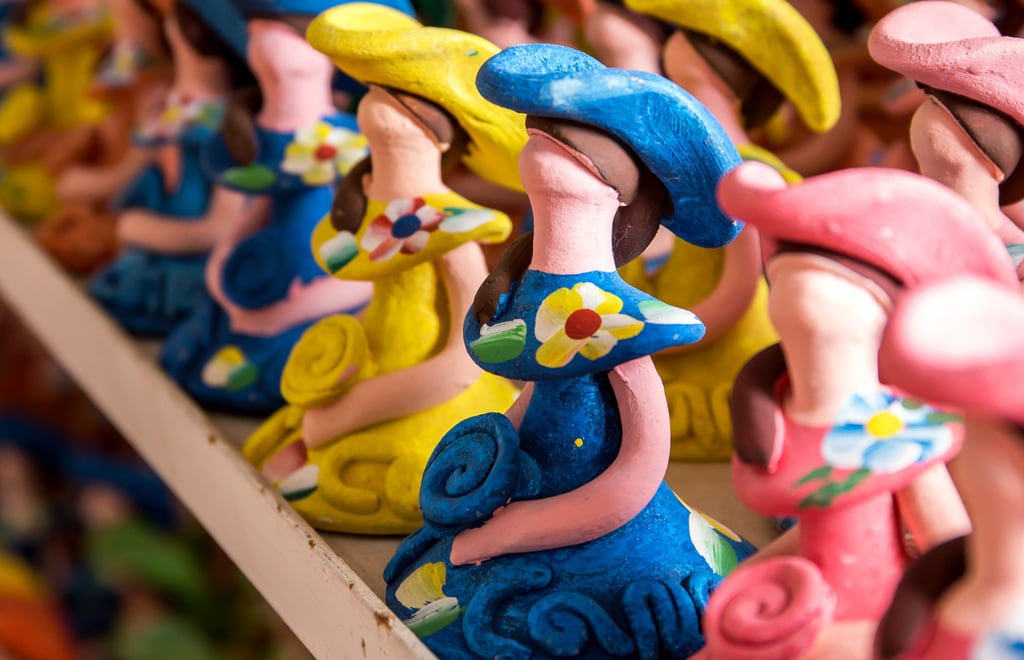 Muñecas Limé faceless dolls from the Dominican Republic, colorful handmade ceramic souvenirs