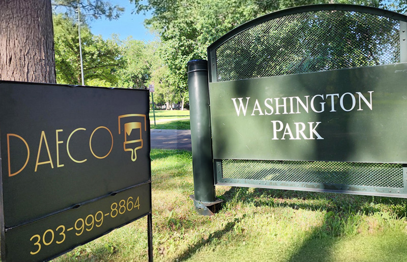 Washinton Park and DAECO sign side by side