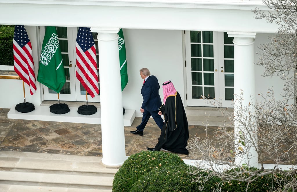 President Donald Trump walks with Saudi Crown Prince Mohammed bin Salman along the White House