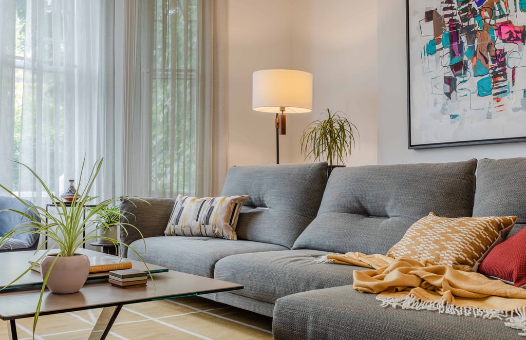 Roche Bobois sofa and beautiful Kvadrat Kilim rug seen in this image 