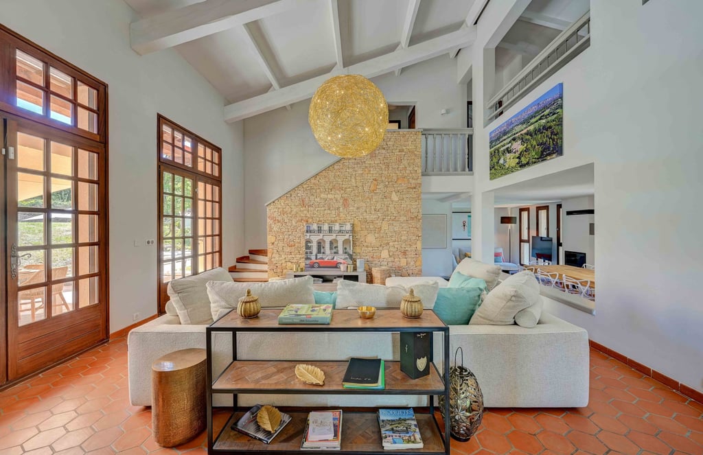 a living room with a couch and a table