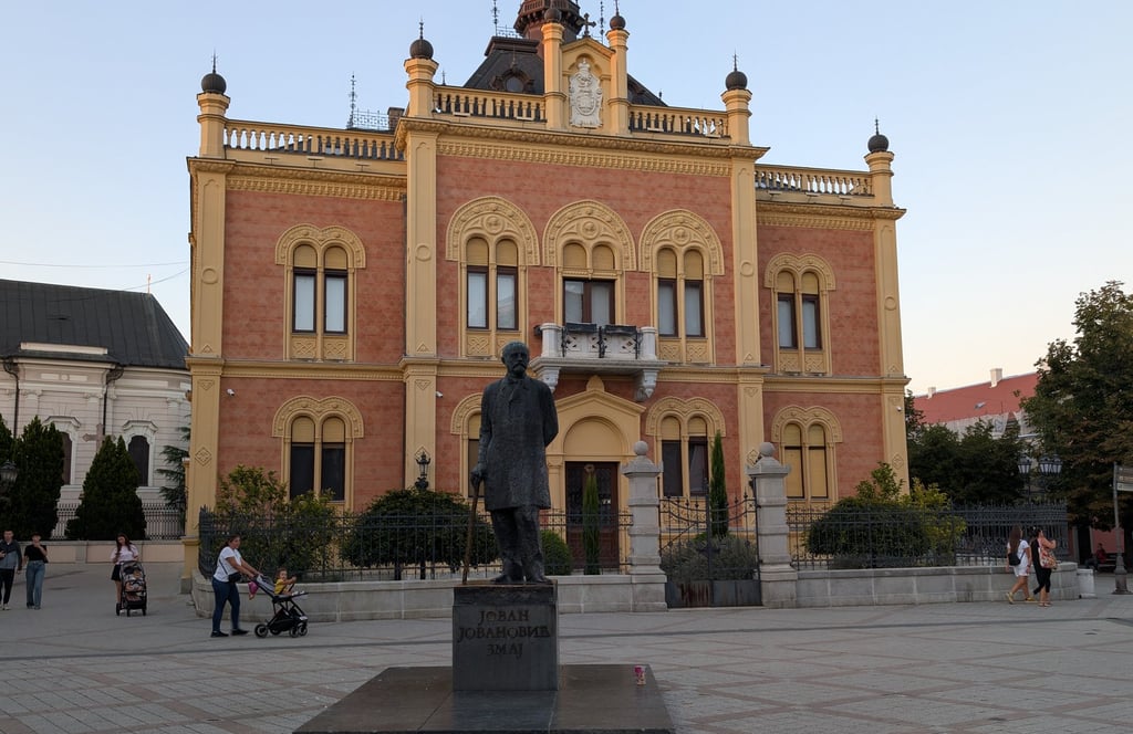 Statue of Jovan Jovanovic Zmaj in front of the Bishop's Palace in Novi Sad, Serbia.