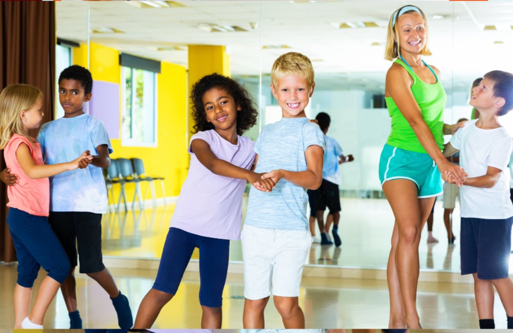 diverse group of kids practicing dancing ballroom style