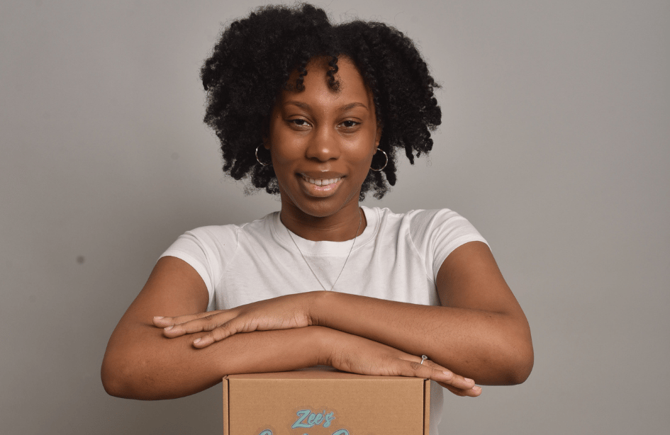 beautiful black woman smiling with cookies