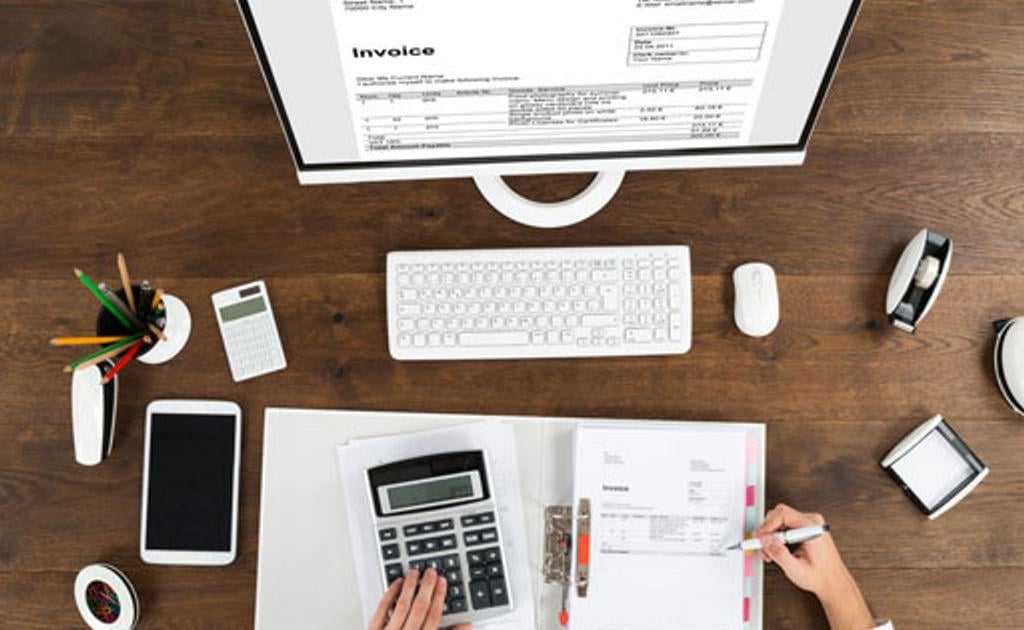Création d’une facture conforme avec calcul de TVA et mentions obligatoires
