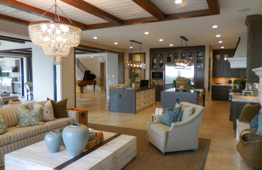 a living room with a couch and a piano
