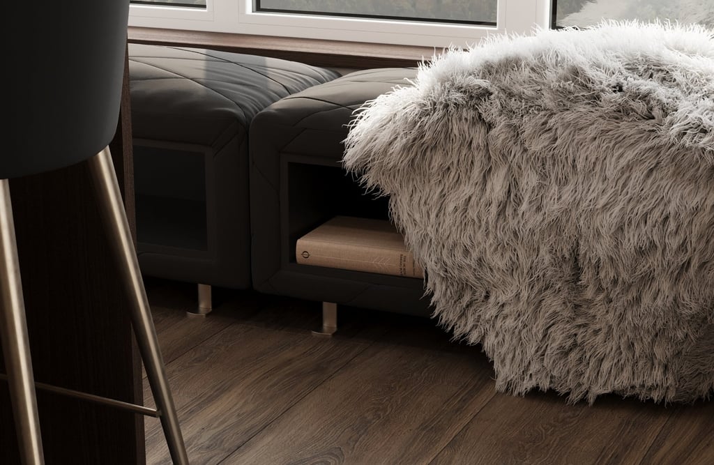 a couch with a fur rug and a chair