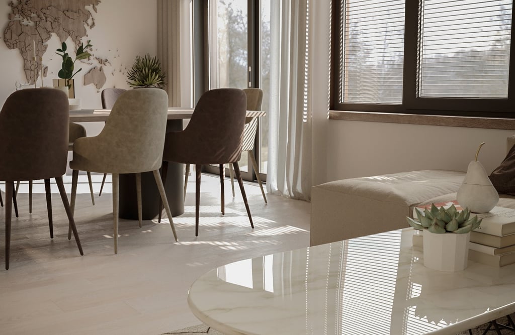 a living room with a table and chairs