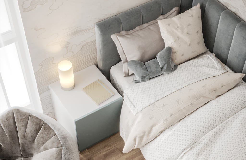 a bed with a bed and a chair