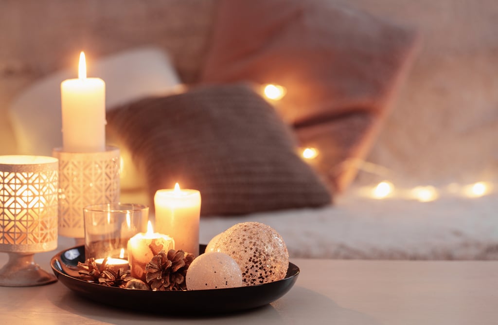 candles and candles are on a table with candles