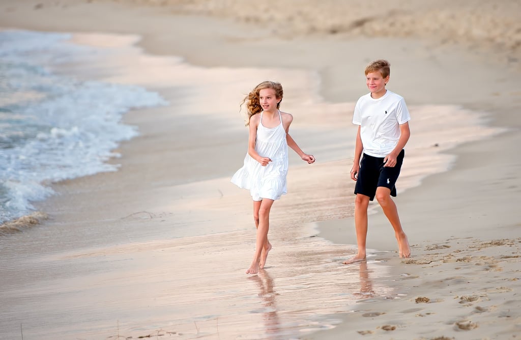 Siblings enjoy Cottesloe Beach at sunset Fisher Photography Beach Photos