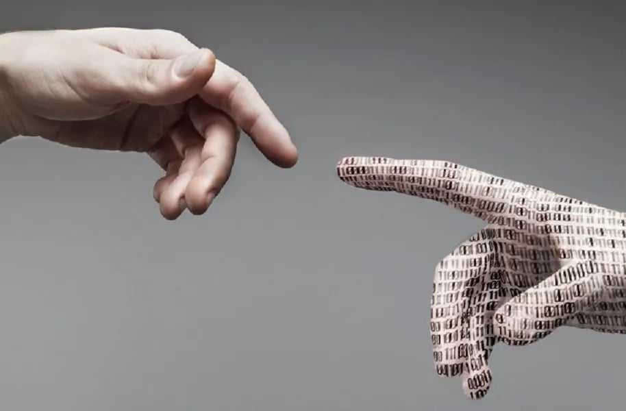 a person reaching out of a hand with a newspaper clipping
