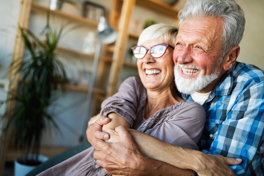 Happy elderly couple happy with life