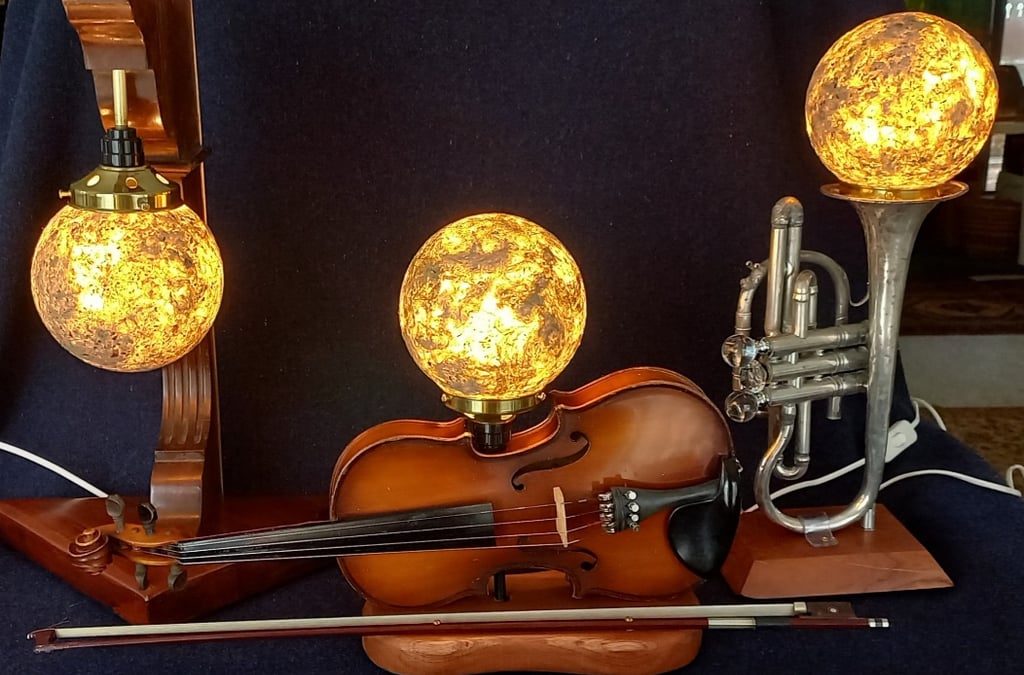Left：Piano leg light stand  Middle:Viloline light stand, Left: Tranpet light stand