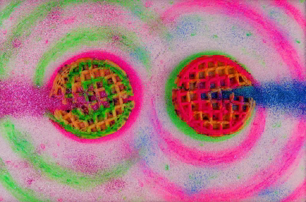 Waffles with neon paint swirls and glitter