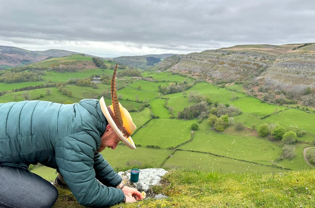 Rijusiddha making offerings at the top of Castell Bran