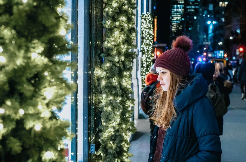 Looking at Shop Windows on Fifth avenue in New York
