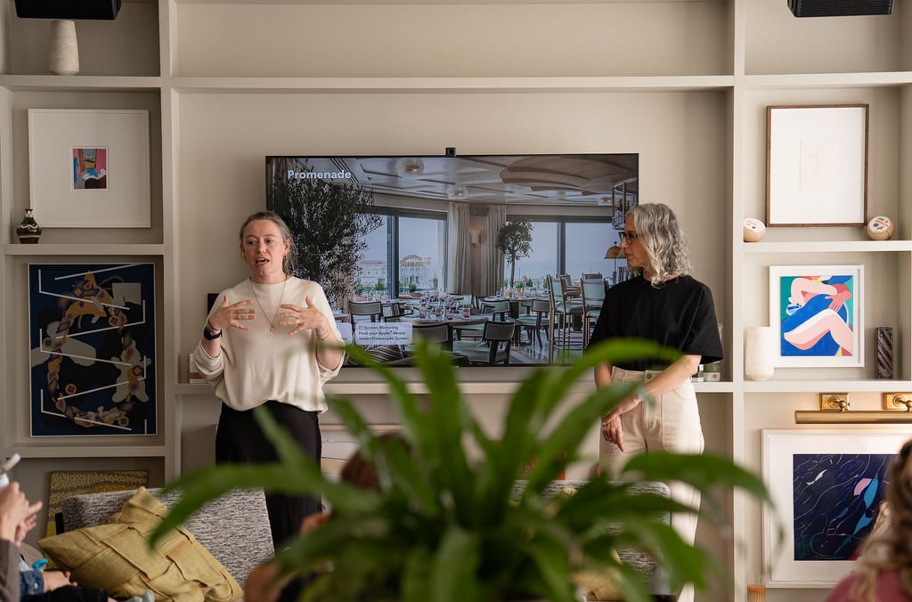 Two women explain about product to the audience