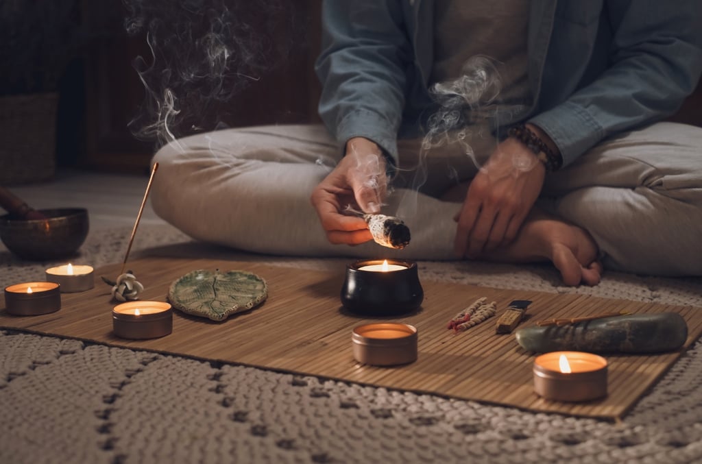 Spiritual cleansing and protection ritual performed in a calm candlelit environment