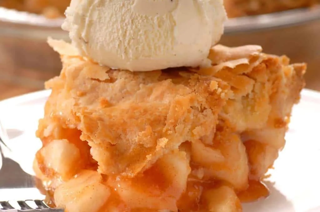 slice of apple pie with ice cream