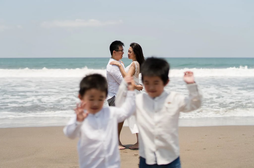 Children running and playing during a natural family photography session at W Bali Seminyak
