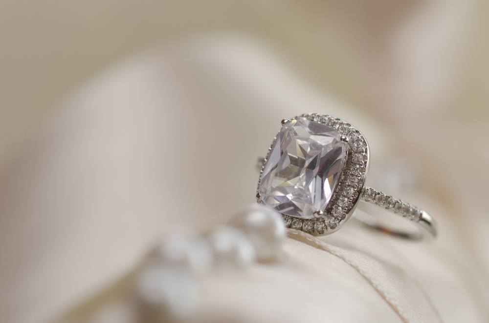 a ring with a CVD diamond ring and a pearl ring
