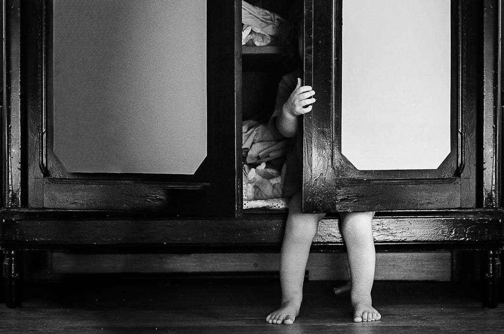 a child's feet are shown in a black and white photo