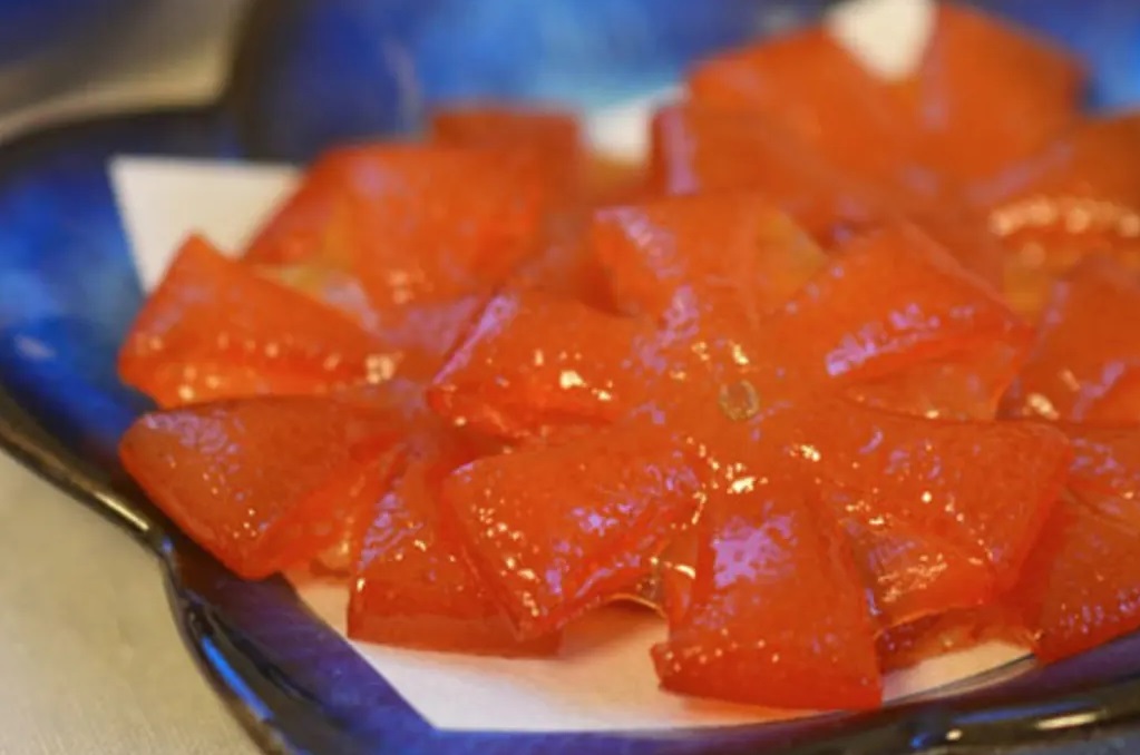 candied kumquats pressed into flower shapes