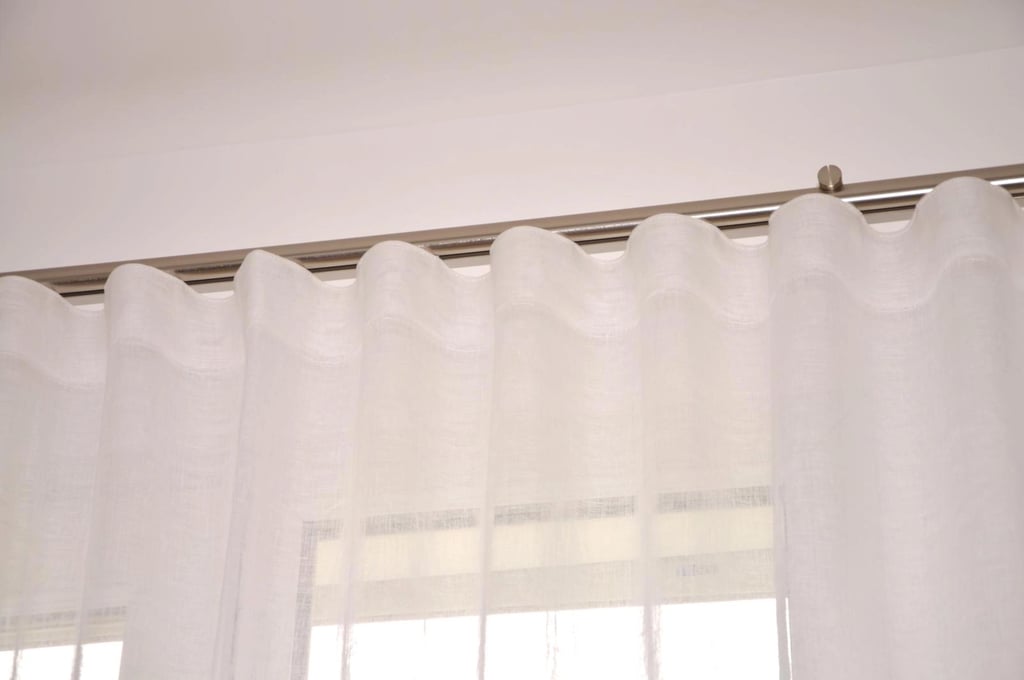 Tête de rideau à vague