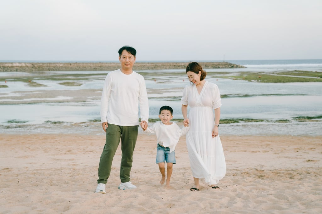 Ah Chin Wo family photography session at The Apurva Kempinski Bali captured by a luxury family photographer in Bali.
