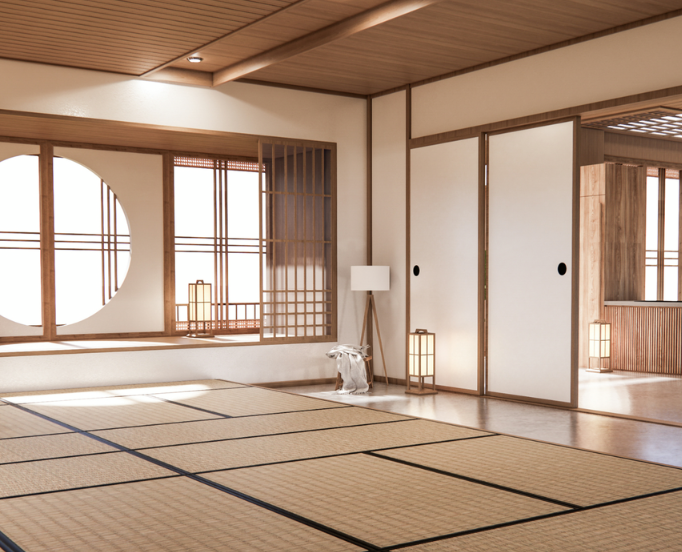 Tatami mats covering the floor of a Japanese-style room with sliding doors and paper lanterns.