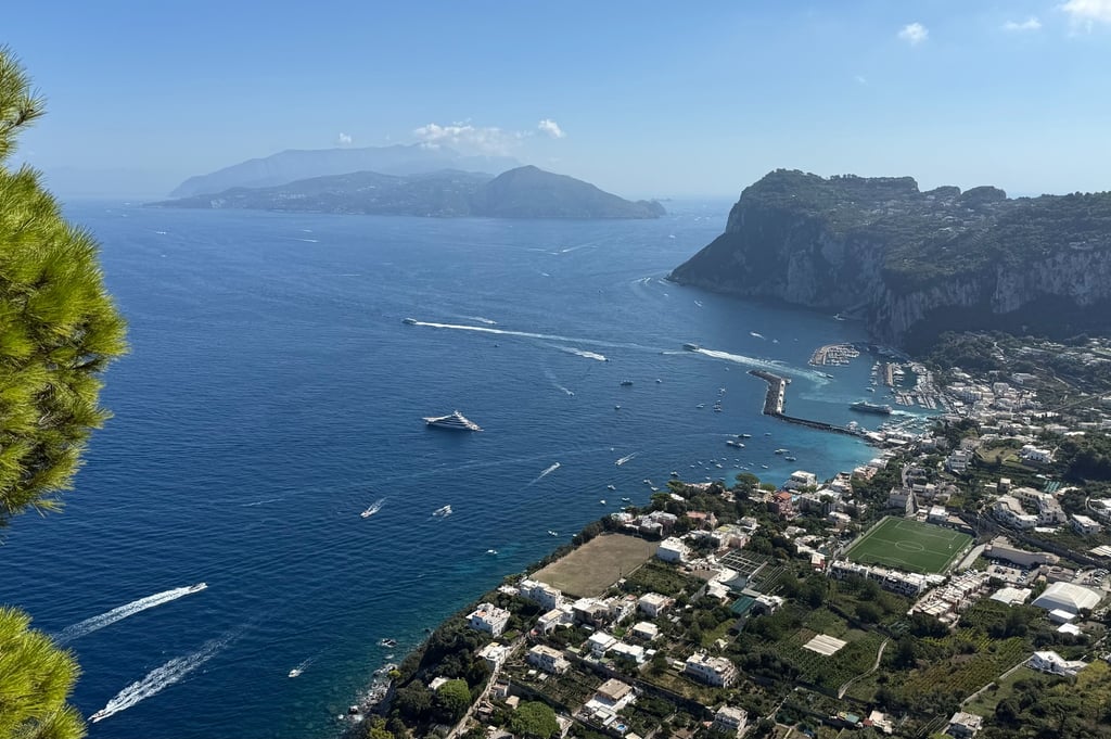Scenic view from the Capri to Anacapri chair lift with blue water and landscape below