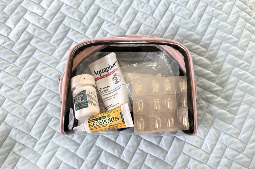 Close up of my clear medication travel bag that keeps medicines and supplements organized on trips