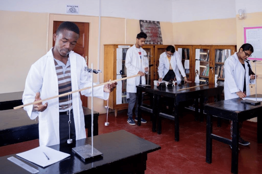 a man in a lab coat and tie dye dye dye dye dye dye dye dye