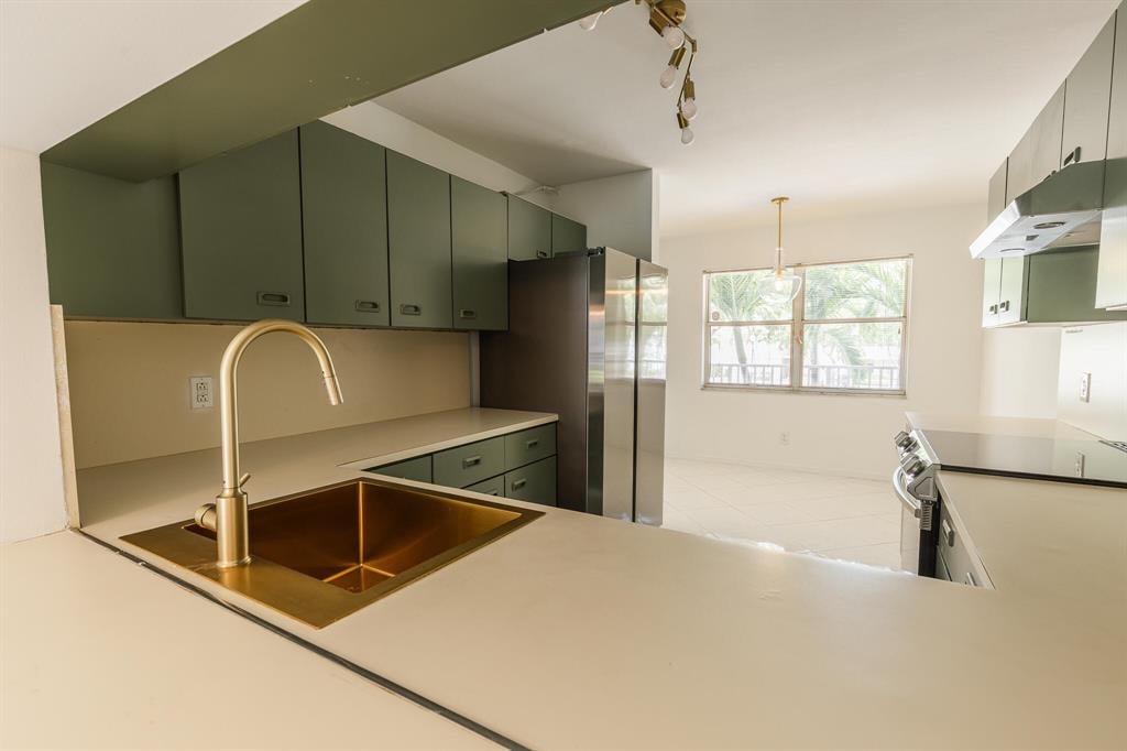 a kitchen with a sink and a window