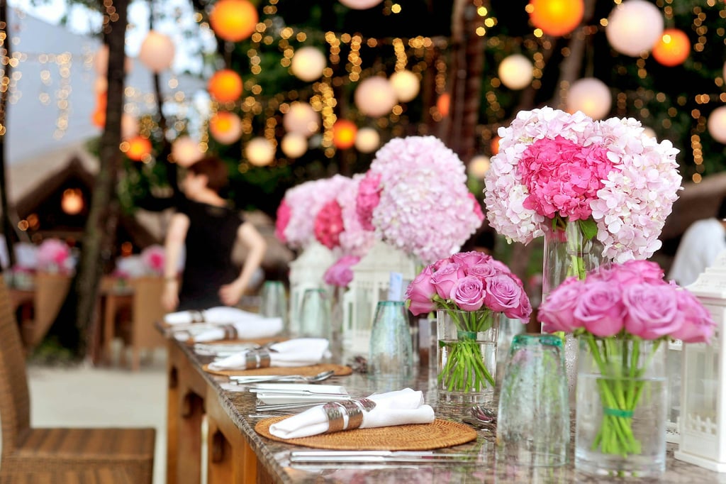 Pink flowers as centerpieces on an event table