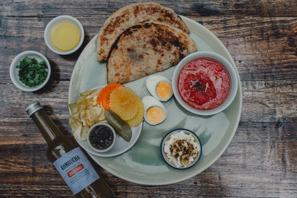 a plate with a variety of food items on it