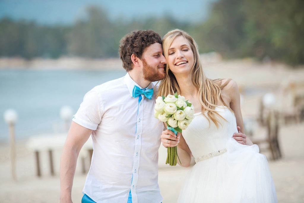 Wedding walk photoshoot on the Wihn Dam Beach Phu Quoc