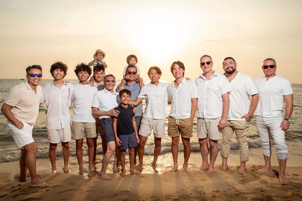 Large family beach photoshoot at sunset Phu Quoc