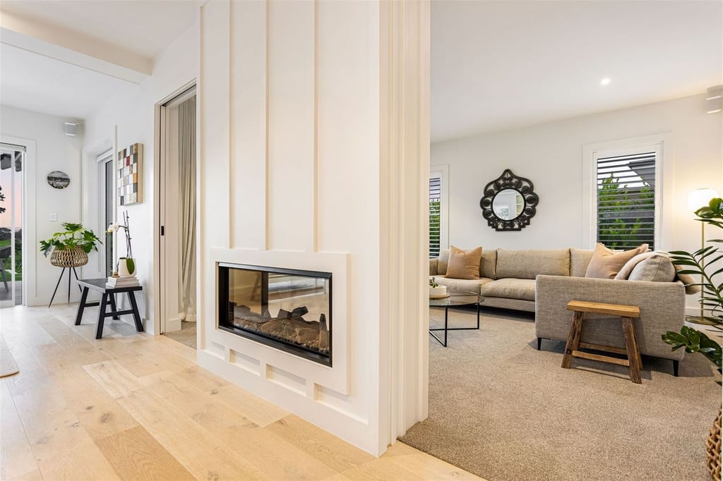 formal lounge with custom gas fireplace - Highend Homes