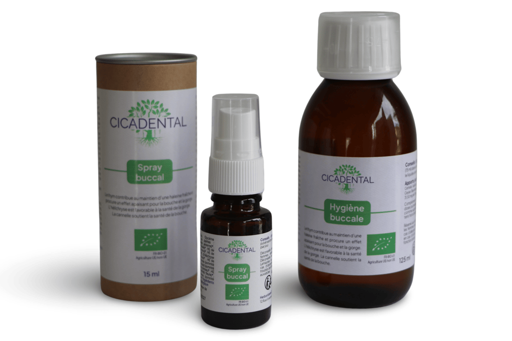 Cicadental organic oral care products including natural buccal spray and mouthwash bottles.