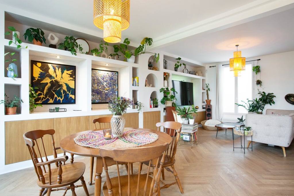a dining room with a table and chairs